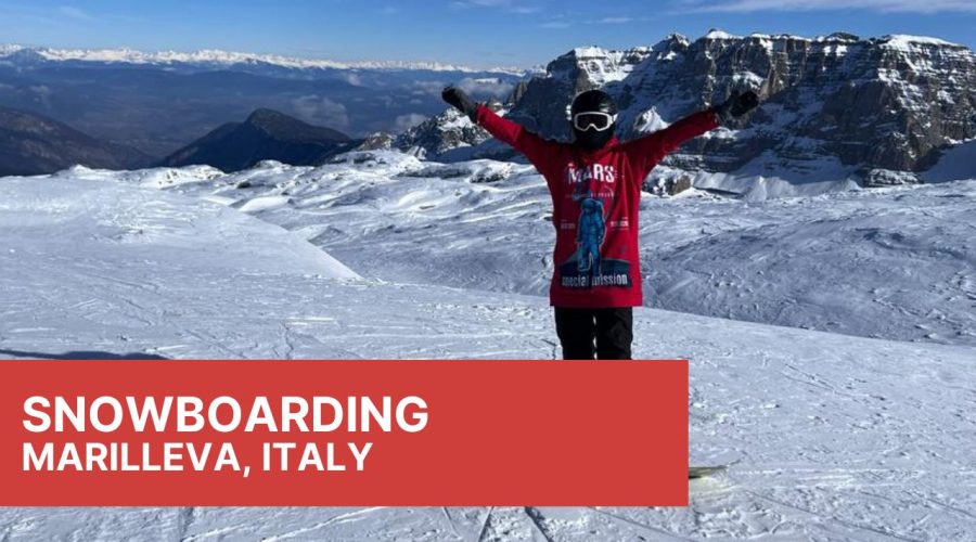 Snowboarding and Ski at Sunny Mountains in city Marilleva, Italy